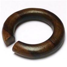 Circular wooden ear plug