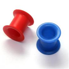 Silicone Flesh Tunnel. Available in white, red and blue colors.